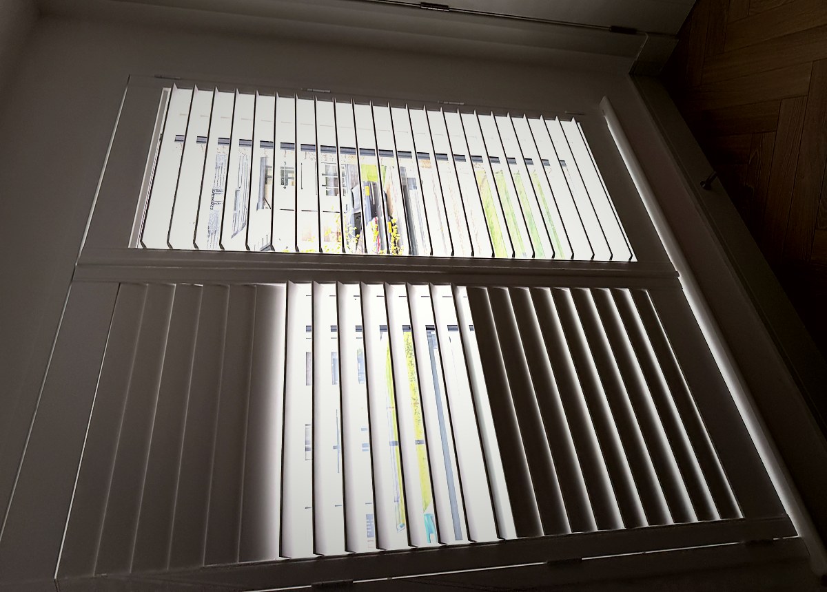 Light airy room with plantation shutters